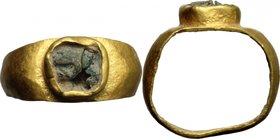 Gold ring with green glass paste.
 Roman period, I-III century AD.
 Size 13.5mm. 2.81 g.