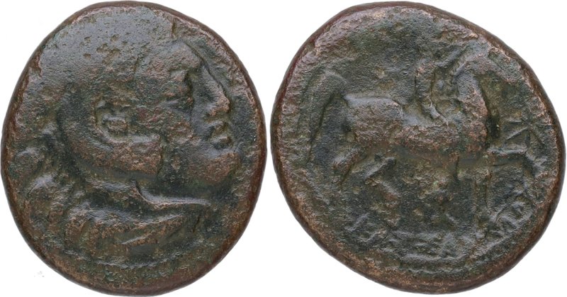 319-297 aC. Filipo III. GC 6755. Ae. 6,19 g. Anv. Cabeza de Heracles recubierta ...