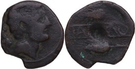 80 aC. Carmo (Sevilla). Semis. AB 988. Ae. 7,54 g. Anv. Cabeza masculina a derecha, detrás delfín. Rev. KARMO entre dos espigas a izquierda. BC-. Est....