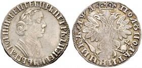 Peter I, 1682-1725 
 Polupoltinnik 1704, Red Mint. 6.94 g. Overstruck on european thaler or half-thaler. Of all the 5 polupoltinniks 1704 in this sal...