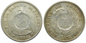Chile. 1 Peso. 1884. So. Santiago. (km#142.1). Republica de Chile. 24,85 gr Ag. Resello 1/2 Real Republica de Guatemala 1894. (km#216). 
Grado: mbc