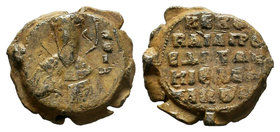 Lead seal of Vaïos protoproedros and doux of ...(?) (11th cent.
Diam.: mm Weight: 13.03 gr. Condition: VF. Attractive natural patina.
Obverse: The bus...
