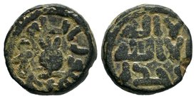 UMAYYAD, Anonymous. 8th century Æ post-reform fals. No Mint (Palestine region) & No Date. Pomegranate, Album-158.

Condition: Very Fine

Weight: 4.92g...
