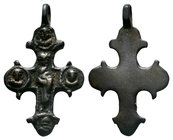 Byzantine Silver Cross Pendant. 8th-12th century AD. 
Cross Pendant with Saints. 10th-13th century AD. A gilt silver reliquary cross pendant with hing...