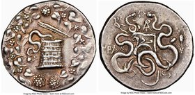 LYDIA. Tralles. Ca. 166-128 BC. AR cistophorus (27mm, 12.67 gm, 1h). NGC XF 4/5 - 4/5. Serpent emerging from cista mystica; all within ivy wreath / Tw...