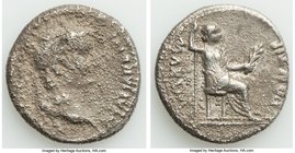 Tiberius (AD 14-37). AR denarius (19mm, 3.42 gm, 6h). VF, corroded. Lugdunum. TI CAESAR DIVI-AVG F AVGVSTVS, laureate head of Tiberius right / PONTIF-...