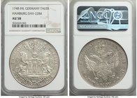 Hamburg. Free City Taler 1748-IHL AU58 NGC, KM405, Dav-2284. Exhibiting only light rub and scattered handling, flashy silvery light and watery luster ...