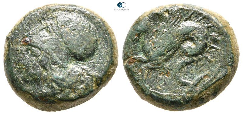Sicily. Syracuse. Timoleon 344-336 BC. 
Trias Æ

17 mm., 6,44 g.



nearl...