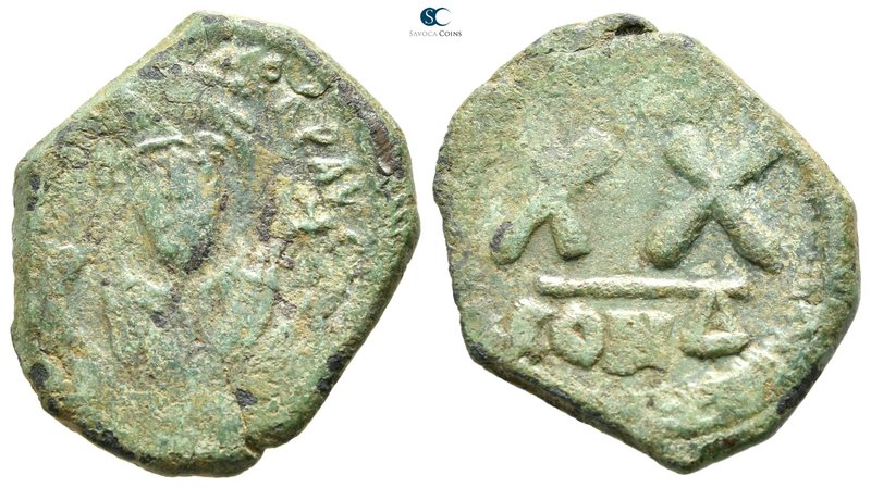 Phocas. AD 602-610. Constantinople
Half follis Æ

23 mm., 5,32 g.



near...