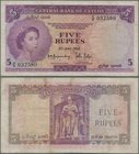 Ceylon: 5 Rupees 1952, P.51, nice and still fresh color note with some minor spots and creases in the paper. Condition: F+/VF
 [taxed under margin sy...