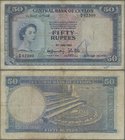 Ceylon: 50 Rupees 1952, P.52, rare banknote, small graffiti at lower center on front and lightly toned paper. Condition: F
 [taxed under margin syste...