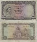 Ceylon: 100 Rupees 1954, P.53, very popular banknote in good condition with a few folds and creases and minor spots. Condition: F+/VF
 [taxed under m...