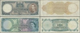 Fiji: set of 2 banknotes containing 5 Shillings 1938 P. 37a, first issue date, portrait KGVI, used with folds and creases, light stain in paper, press...