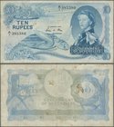 Seychelles: Government of Seychelles 10 Rupees 1974, P.15b, still nice with several folds and rusty spots. Condition: F
 [taxed under margin system]