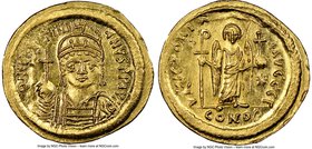 Justinian I the Great (AD 527-565). AV solidus (22mm, 4.42 gm, 5h). NGC MS 4/5 - 3/5, graffito, die shift. Constantinople, 3rd officina. D N IVSTINI-A...