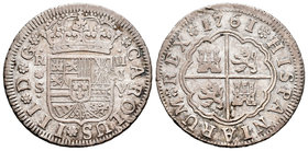 Carlos III (1759-1788). 2 reales. 1761. Sevilla. JV. (Cal-1435). Ag. 5,74 g. Raya en anverso. BC+. Est...25,00.