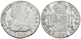 Carlos III (1759-1788). 8 reales. 1782. México. FF. (Cal-932). Ag. 26,64 g. Raya en anverso y dos pruebas en el canto. Limpiada. MBC. Est...80,00.