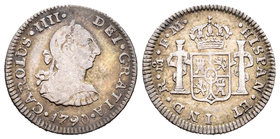 Carlos IV (1788-1808). 1/2 real. 1790. México. FM. (Cal-1285). Ag. 1,68 g.  Busto de Carlos III y ordinal IIII. Muy escasa. BC+/MBC-. Est...50,00.