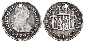 Carlos IV (1788-1808). 1/2 real. 1792. Santa Fe de Nuevo Reino. JJ. (Cal-1327). Ag. 1,62 g. Agujero. Rarísima. MBC-. Est...180,00.
