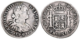 Carlos IV (1788-1808). 2 reales. 1791. Lima. IJ. (Cal-935). Ag. 6,56 g. Cabeza grande. MBC-. Est...70,00.
