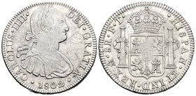 Carlos IV (1788-1808). 8 reales. 1802. México. FT. (Cal-698). Ag. 26,88 g. Restos de brillo original y rayas en anverso. MBC+. Est...100,00.
