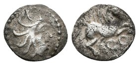 EMPORITON. Hemitritartemorión. Sant Martí de Ampurias (Gerona). 450-400 a.C. A/ Cabeza femenina con tocado a derecha. R/ Pegaso volando a derecha, deb...