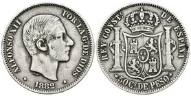 ALFONSO XII. 50 Centavos de Peso. 1882. Manila. Cal-82. Ar. 12,85g. MBC.