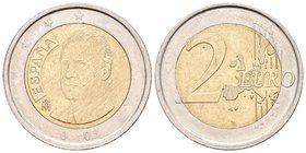 JUAN CARLOS I. 2 Euros. 2003. Acuñación débil afectando a la fecha apreciándose parcialmente. CuNi. 8,47g. MBC+. Rara.