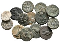 EBUSUS. Lote compuesto por 14 monedas, conteniendo 12 monedas de 1/4 de Calco con diferentes variantes, una tessera de plomo con delfín y un bronce de...