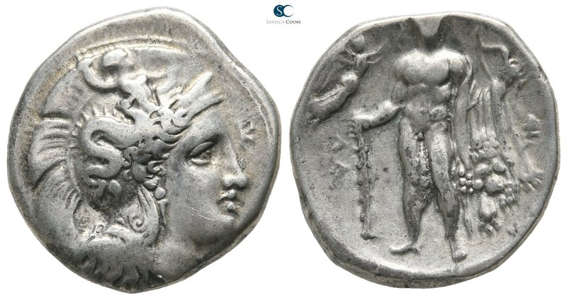 Lucania. Herakleia circa 330-325 BC. 
Nomos AR

21 mm., 7,79 g.

Head of At...