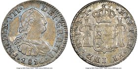 Ferdinand VII 1/2 Real 1816 So-FJ MS61 NGC, Santiago mint, KM64. Scarce in Mint State and attractively toned, the surfaces aged gunmetal with light bl...