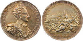 SCHWEDEN KÖNIGREICH
Karl XII., 1697-1718. Vergoldete Silbermedaille 1700 v. G. Hautsch (Vs.) / P. H. Müller (Rs.) Auf den Sieg der Schweden über die ...