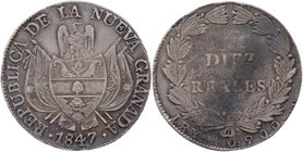 KOLUMBIEN
Republik Nueva Granada, 1837-1859. 10 Reales 1847 KM 107. getönt, Rs. Schrötlingsfehler, ss/s