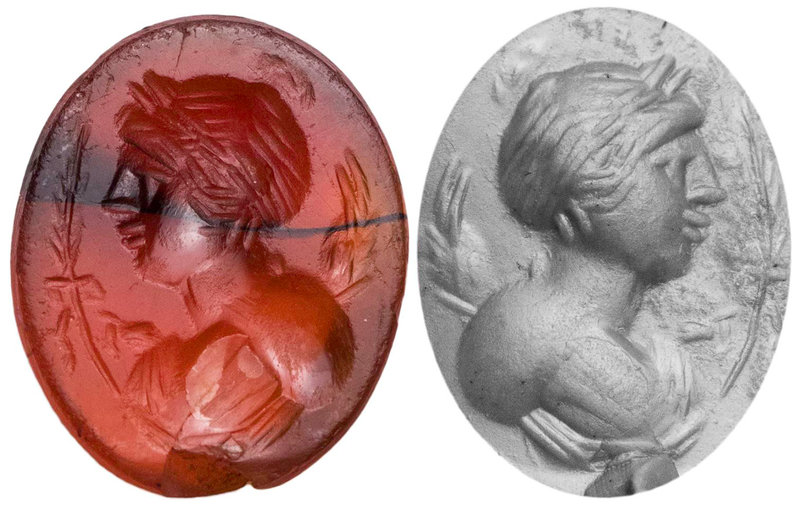 GEMMEN UND SIEGELSTEINE
 Intaglio Karneol, orange mit schwarzem Einschluss, hoc...