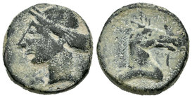 Cartagonova. Calco. 220-215 a.C. Cartagena (Murcia). (Abh-511). (Acip-580). Anv.: Cabeza de Tanit a izquierda. Rev.: Cabeza de caballo a derecha, dela...