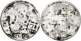 1811. Fernando VII. Valencia. GS. 2 reales. (Cal. 1058). 5,33 g. Resello de Vique (Cuba) (De Mey 481). BC+.