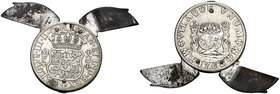 s. XX. Pequeña navaja multiusos realizada en una réplica de una moneda de 4 reales de Carlos III México 1768. En la hoja de la navaja: "I. Paya / Ibi"...