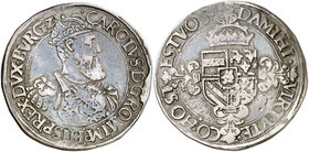 s/d. Carlos I. Amberes. 1 florín carolus. (Vti. 565) (Vanhoudt 224.AN). 22,55 g. Pátina. Muy rara. MBC.