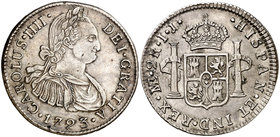 1793. Carlos IV. Lima. IJ. 2 reales. (Cal. 937). 6,62 g. Segundo busto propio. Hojita. Ex Colección Manuela Etcheverría. Escasa. MBC+.