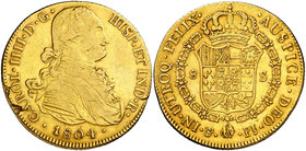 1804. Carlos IV. Potosí. PJ. 8 escudos. (Cal. 111) (Cal.Onza 1103). 26,84 g. Hojitas en borde. Bonito color. MBC.