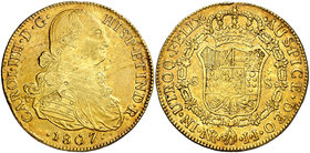 1807. Carlos IV. Santa Fe de Nuevo Reino. JJ. 8 escudos. (Cal. 143) (Cal.Onza 1147) (Restrepo 97-38). 26,88 g. Hojitas. Precioso color. MBC+.