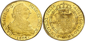 1803. Carlos IV. Santiago. FJ. 8 escudos. (Cal. 165) (Cal.Onza 1174). 27 g. Hojitas en reverso. Rayitas. Parte de brillo original. MBC+.