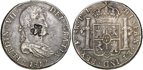 1817. Fernando VII. 8 reales. 26,99 g. AG. Resello GR bajo corona (EBC) para circular como 6 chelines y 1 penique (De Mey 371). Soldadura en el canto....