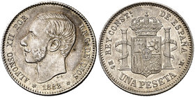 1882/1*1882. Alfonso XII. MSM. 1 peseta. (Cal. 57). 4,91 g. Bella. Pátina. Parte de brillo original. Rara así. EBC.