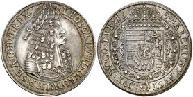 1699. Austria. Leopoldo. 1 taler. (Kr. 1303.5) (Dav. 3245A). 29 g. AG. Golpecito en canto. Preciosa pátina. EBC.