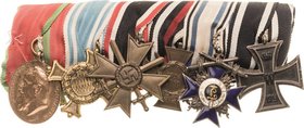 Ordensspangen
Spange mit 6 Auszeichnungen Bayern - Jubiläumsmedaille für die bayerische Armee 1905. Dienstauszeichnung 2. Klasse für 12 Dienstjahre. ...