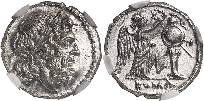 RÉPUBLIQUE ROMAINE
Anonyme (211-208 av. J.C.). Victoriatus.
Av. Tête laurée de...