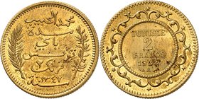TUNISIE
Ahmed Bey (1348-1361 AH / 1929-1942). 2 francs 1928, essai en laiton.
Av. Inscription entre deux branches. Rv. Valeur dans une couronne.
L....