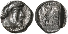 PHILISTIA (PALESTINE). Gaza. Mid 5th century-333 BC. Obol (Silver, 8 mm, 0.65 g, 3 h). Laureate bearded male head to right. Rev. Falcon standing right...