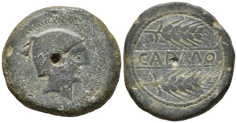 CARMO. As. 80 a.C. Carmona (Sevilla) A/ Cabeza masculina a derecha, con casco de...